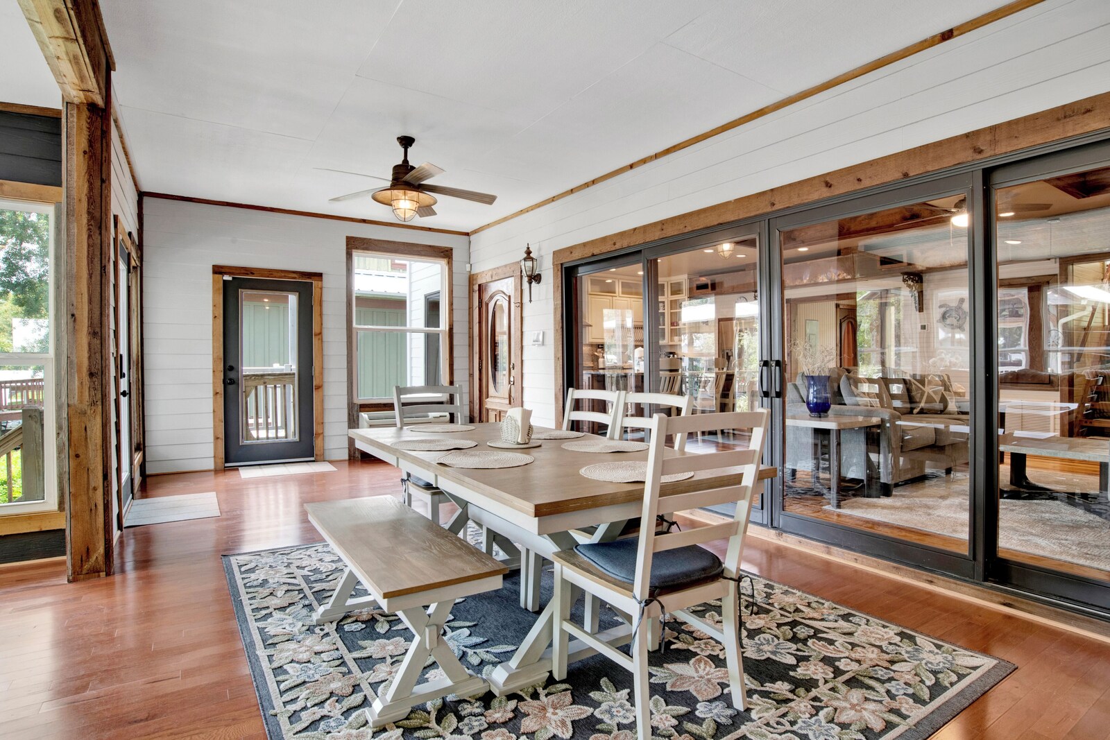 Dining area with a long wooden table and seating for the group